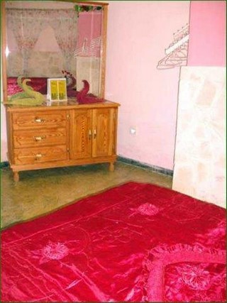Habitacion doble con cama de matrimonio en el Apartamento Ileana