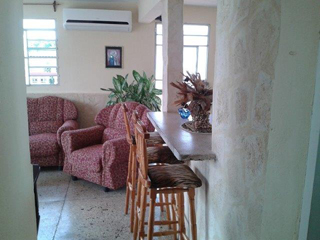 Salón del apartamento independiente Heriberto 